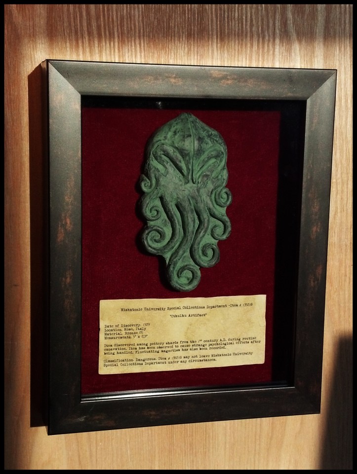 Item discovered among pottery shards from the 1st century A.D. during routine excavation. Item has been observed to cause strange psychological effects after being handled. Fluctuating magnetism has also been recorded. Classification: Dangerous. Item #135218 may not leave Miskatonic University Special Collections Department under any circumstances.